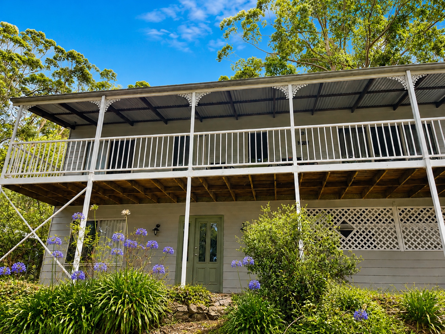The Lookout house, long balcony, garden and gum trees
